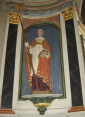 Statue de Saint Gwenaël à la droite de l'autel de l'église paroissiale